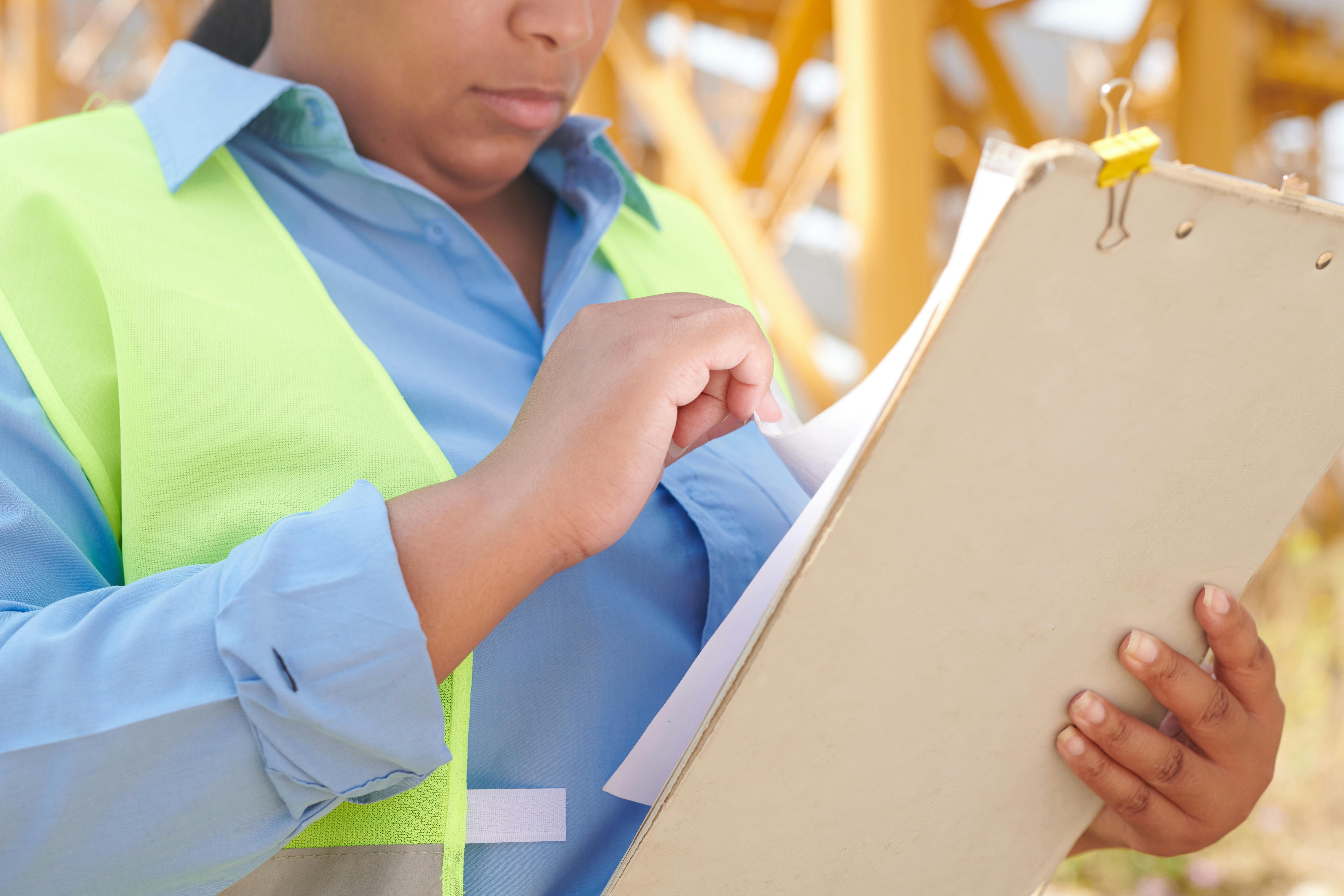 Project managers reviewing bid documents and project setup