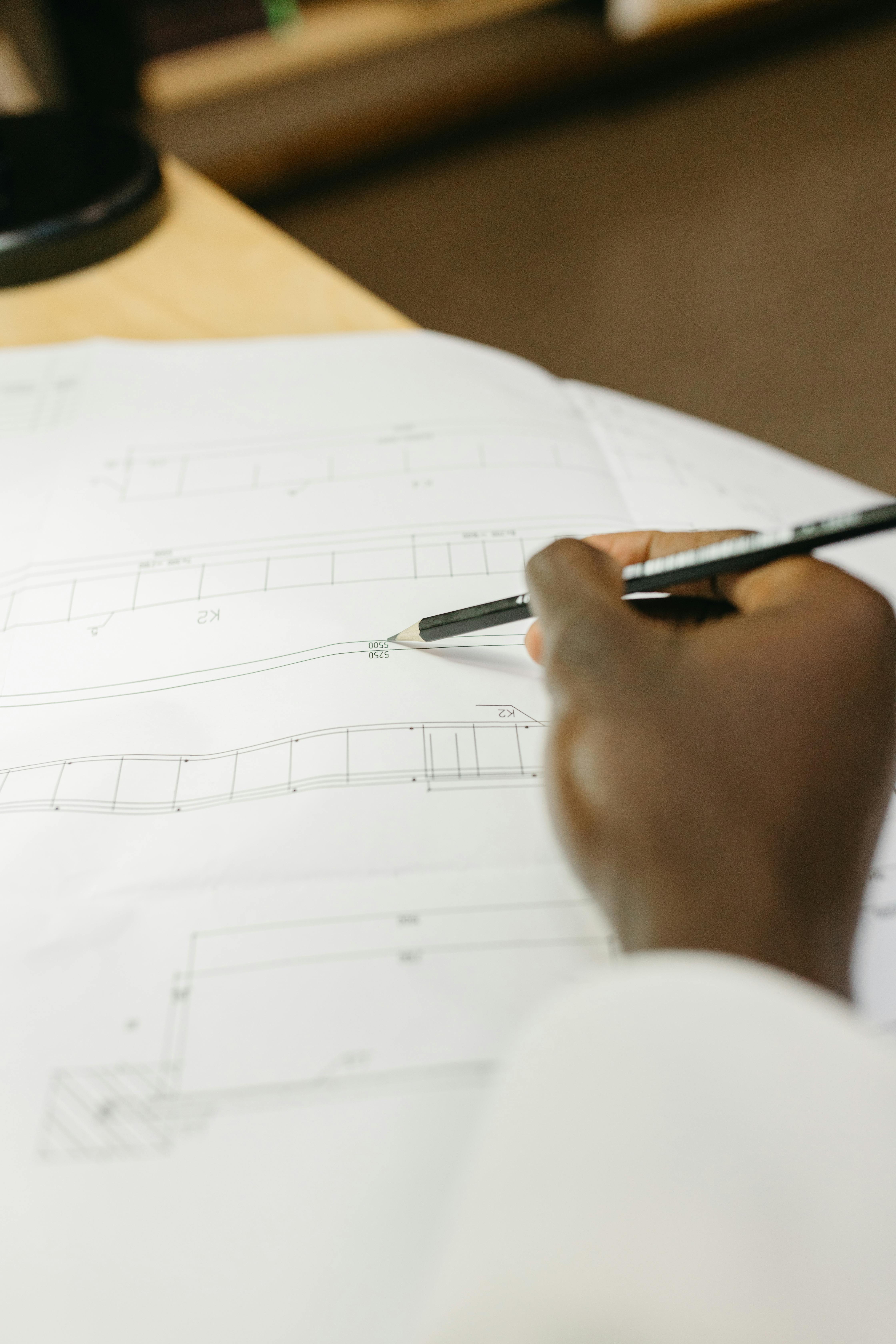 Professional project team discussing designs and construction plans