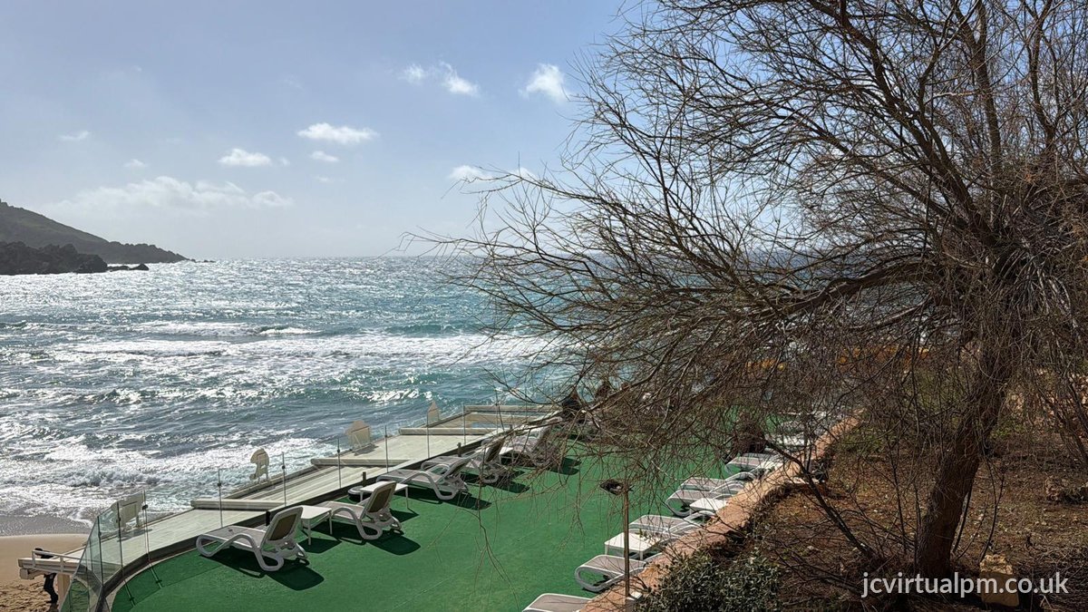 beachside sun loungers coastal terrace