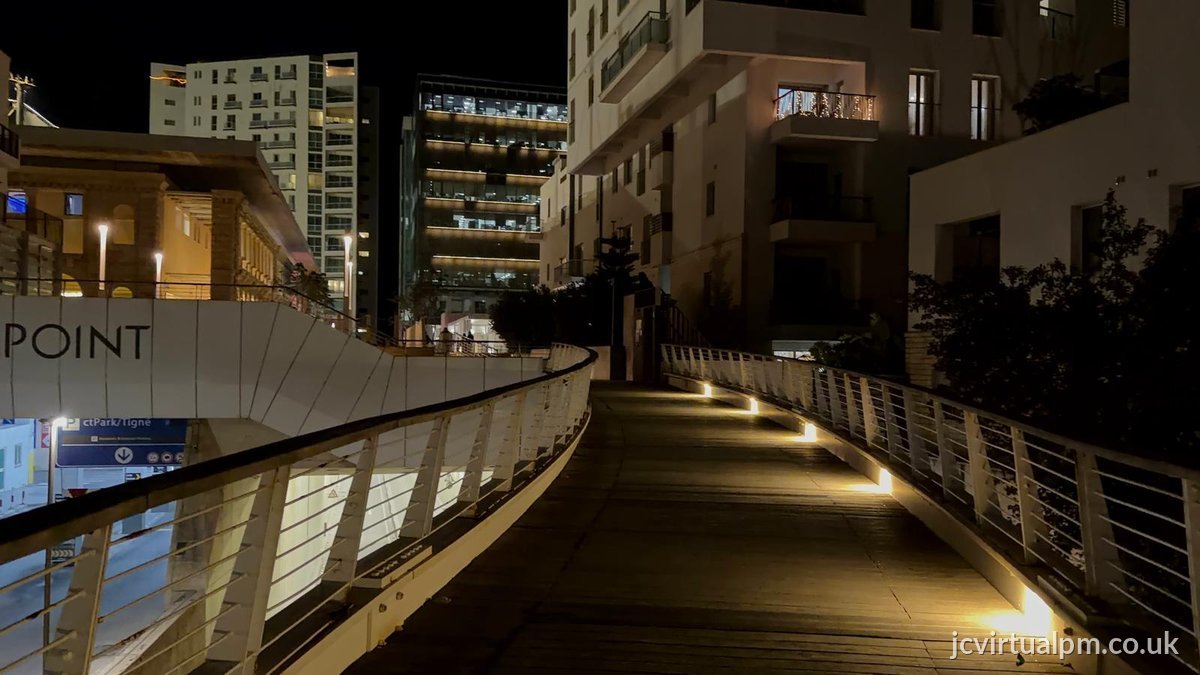 urban walkway bridge night lights